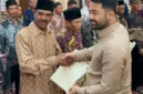 Penyerahan sertipikat hak milik untuk 194 bidang tanah transmigran di SP 1 Padang Tarok, Kabupaten Sijunjung, Sumatera Barat, melalui Program Trans Tuntas (foto: kementerian transmigrasi)